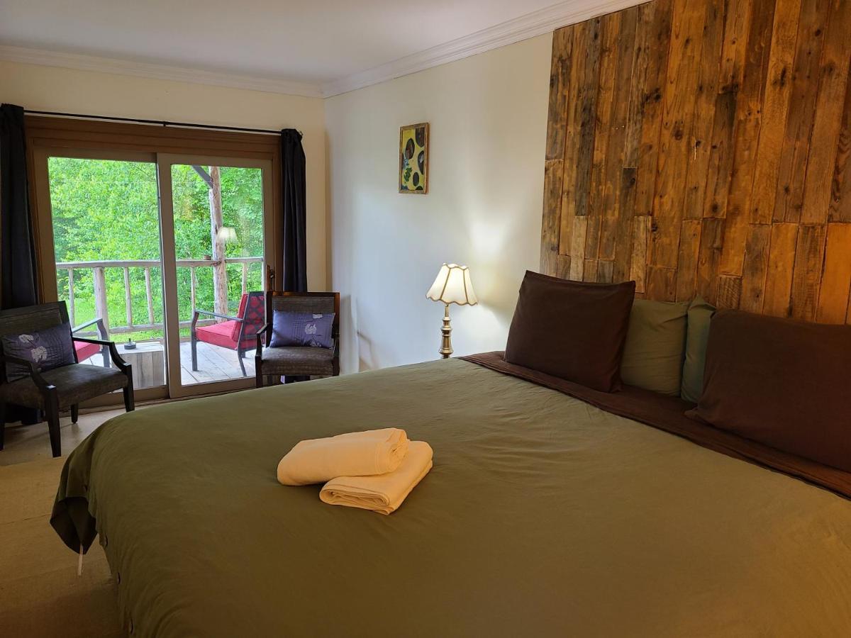 Le Lodge Du Lac Saint-Faustin Bagian luar foto