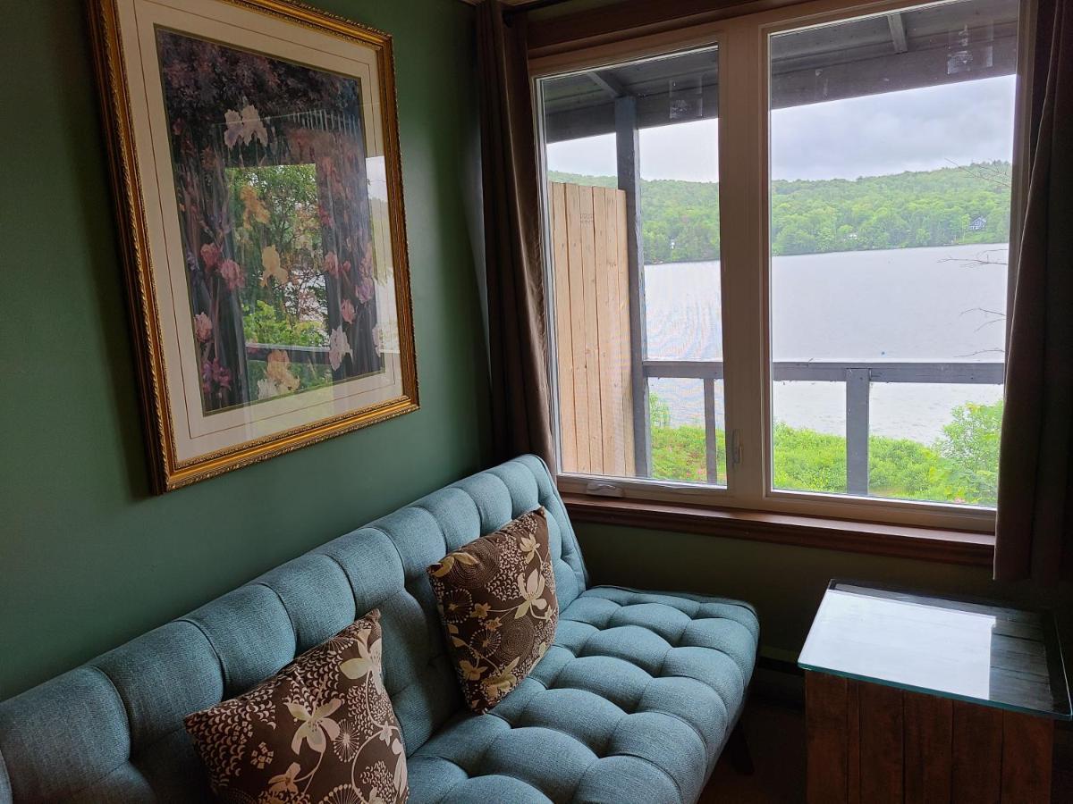 Le Lodge Du Lac Saint-Faustin Bagian luar foto